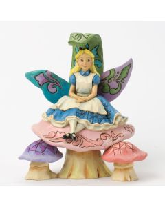 Figurine de collection Alice assise sur un champignon